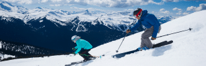 BillW-success-story-skiers-going-down-Whistler