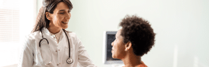 How Preventive Healthcare Extends Your Healthy Years 3 Smiling female clinician gives engaged patient advice