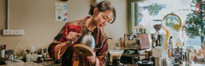 How to Brew Your Coffee to Help Reduce LDL Cholesterol 2 Paper coffee filter by lady at cafe