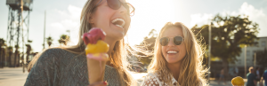 Healthy Eating Hacks for Travellers 2 two girls enjoy holiday ice cream