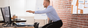 Addressing Sedentary Behaviour: Practical Strategies for Long-Term Health 2 wallsit suit at office